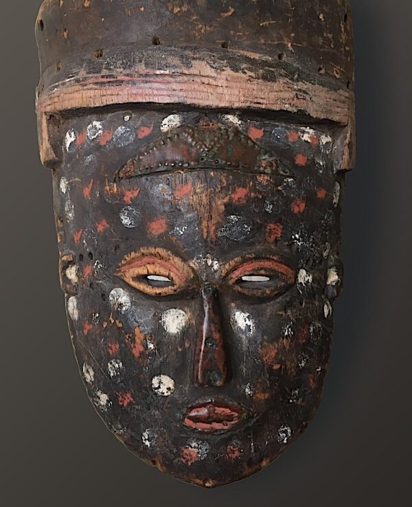 BASHILELE mask - Brown wood with polychrome pigments and copper.