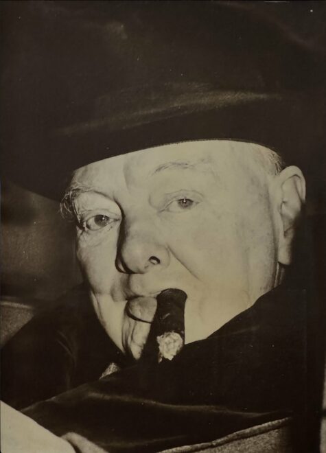 A moving photograph of Winston Churchill, cigar in hand. 1963.