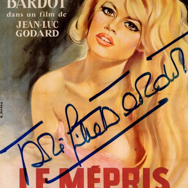 Brigitte Bardot and Michel Piccoli sign a card for the film "Contempt".